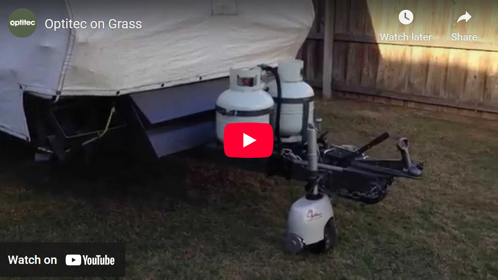 Optimover pulls Supreme Off-road Caravan on Grass in backyard